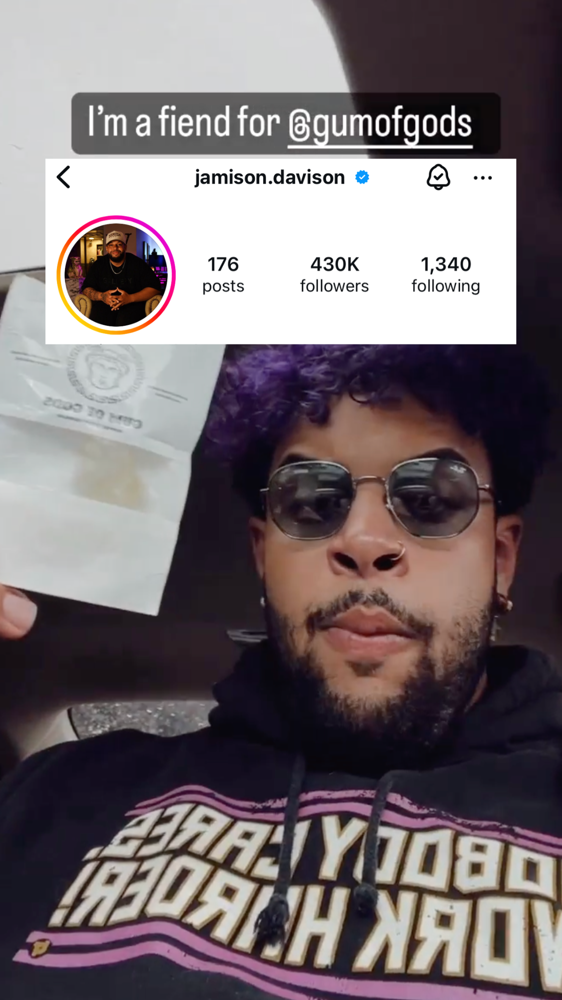 Man holding a packet with a social media profile overlay.